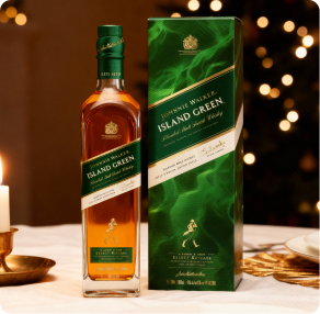 Johnnie Walker Island Green bottle and matching green gift box placed on a wooden surface with warm Christmas lights behind