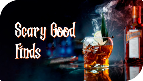 A skull-shaped glass filled with orange liquid and garnished with lime and a leaf, with smoke rising form it. A blurred Cointreau bottle in the background and the phrase: 'Scary Good Finds' in large letters.